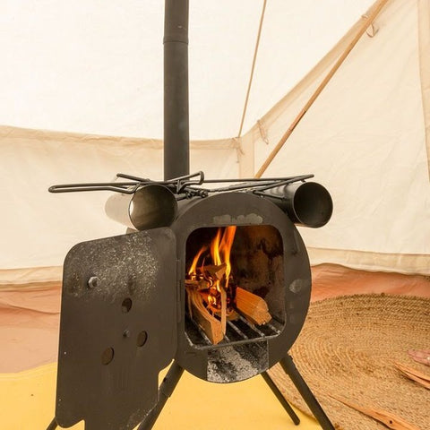 burning wood in a hot tent