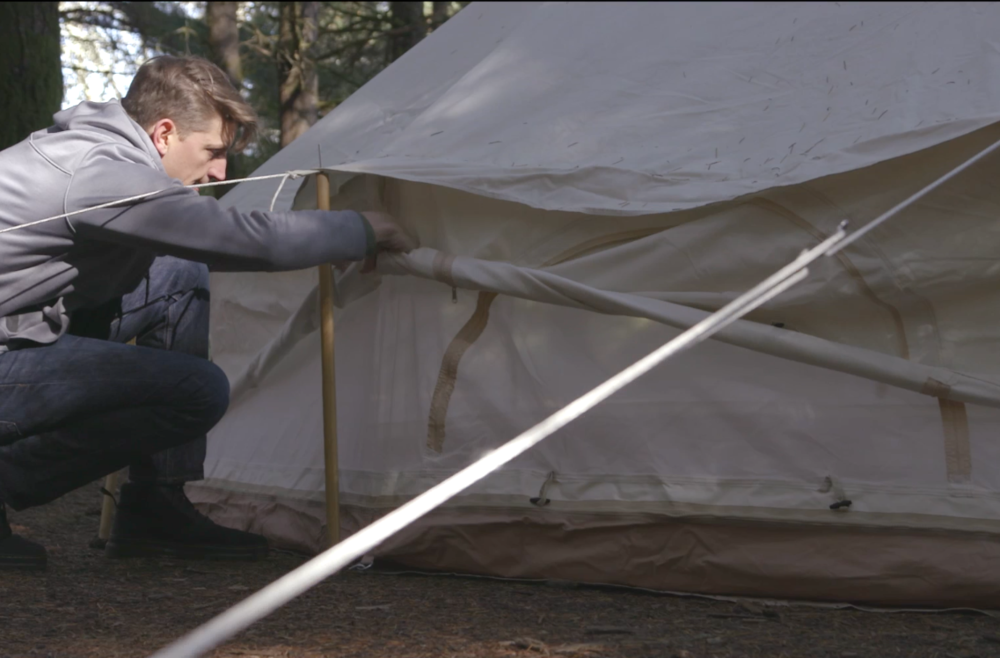 Rolling up bell tent wall